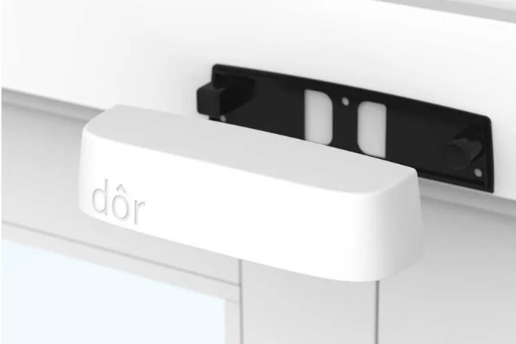 Dor thermal people counter mounted above a store door, with no cameras and no images